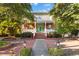 Brick two-story home with a large front porch and landscaping at 764 Edgewood Ne Ave # 1, Atlanta, GA 30307