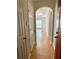 Bright hallway with wood floors and neutral walls at 4333 Dunwoody Park # 1413, Dunwoody, GA 30338