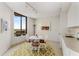 Cozy dining area with a small table and city views at 2660 Peachtree Nw Rd # 18G, Atlanta, GA 30305