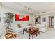 Bright living room featuring a white sofa and large artwork at 2660 Peachtree Nw Rd # 18G, Atlanta, GA 30305