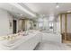 Primary bathroom with double sinks, a soaking tub, and shower at 2660 Peachtree Nw Rd # 18G, Atlanta, GA 30305