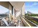 Private balcony with city views and seating area at 2660 Peachtree Nw Rd # 18G, Atlanta, GA 30305