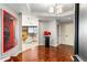 Spacious entryway with hardwood floors and art at 2660 Peachtree Nw Rd # 18G, Atlanta, GA 30305
