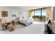 Spacious bedroom with large windows and city view at 2660 Peachtree Nw Rd # 18G, Atlanta, GA 30305