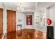 Elegant entryway with hardwood floors and art at 2660 Peachtree Nw Rd # 18G, Atlanta, GA 30305