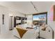 Bright living room with white sofas and city view at 2660 Peachtree Nw Rd # 18G, Atlanta, GA 30305