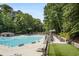 Community lap pool with surrounding lounge area at 57 Northwood Ne Ave, Atlanta, GA 30309