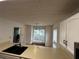 Kitchen with white cabinets, breakfast bar, and double sink at 1101 Lenox Ne Way # 1101, Atlanta, GA 30324