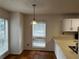 Kitchen features white cabinets, light countertops, and a breakfast nook at 1101 Lenox Ne Way # 1101, Atlanta, GA 30324