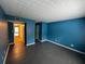 Serene bedroom with dark gray floors and access to hallway at 1101 Lenox Ne Way # 1101, Atlanta, GA 30324