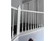Upstairs hallway with gray carpeting and white doors at 533 Riverbirch Trce, Stone Mountain, GA 30087