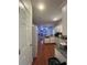 View of kitchen, living room, and hardwood floors at 533 Riverbirch Trce, Stone Mountain, GA 30087