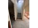 View of the stairs from the ground floor to the upper floor at 533 Riverbirch Trce, Stone Mountain, GA 30087