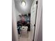 Laundry room with washer, dryer, and shelving at 533 Riverbirch Trce, Stone Mountain, GA 30087