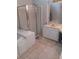 Bathroom with shower, tub, and vanity at 533 Riverbirch Trce, Stone Mountain, GA 30087