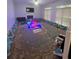 Large living area with decorative floor pillows and seating at 533 Riverbirch Trce, Stone Mountain, GA 30087