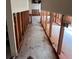 Hallway undergoing renovation with exposed framing and wires at 533 Riverbirch Trce, Stone Mountain, GA 30087
