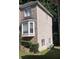 Side view of home showcasing brick and siding at 533 Riverbirch Trce, Stone Mountain, GA 30087