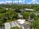 Aerial view of modern townhouses with city skyline in background at 939 Cummings Se St, Atlanta, GA 30316