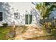 Small patio adjacent to the back of house, near wooded area at 2184 Asquith Sw Ave, Marietta, GA 30008