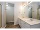 Bathroom boasts double vanity and a large mirror at 4815 Plainsman Cir, Cumming, GA 30028