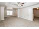 Large main bedroom with trey ceiling, carpet, and ample space at 4815 Plainsman Cir, Cumming, GA 30028