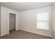 Cozy bedroom with neutral walls, carpet, and a closet at 4815 Plainsman Cir, Cumming, GA 30028