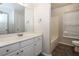 Clean bathroom with white vanity, large mirror, and a shower/tub combo at 4815 Plainsman Cir, Cumming, GA 30028