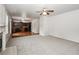 Open living room and kitchen with neutral carpet at 4815 Plainsman Cir, Cumming, GA 30028