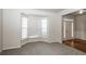 Bright living room featuring a bay window and hardwood floors at 4815 Plainsman Cir, Cumming, GA 30028