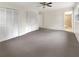Main bedroom with new carpet, large closets, and ensuite bathroom access at 2390 Sandgate Rd, Atlanta, GA 30349