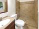 Updated bathroom with a large shower, tile flooring, and modern fixtures at 2390 Sandgate Rd, Atlanta, GA 30349