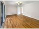 Bright living room with hardwood floors and sliding glass doors at 2390 Sandgate Rd, Atlanta, GA 30349