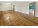 Large living area with hardwood floors and access to the backyard at 2390 Sandgate Rd, Atlanta, GA 30349