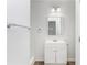 Bright bathroom with white vanity, shower, and tile at 1246 Lyle Ave, East Point, GA 30344