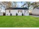 Newly renovated house exterior and front yard at 1246 Lyle Ave, East Point, GA 30344