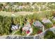 Luxury homes nestled in a wooded community with a golf course at 879 Big Horn Hollow, Suwanee, GA 30024
