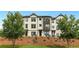 Modern townhomes with landscaped grounds and ample parking at 1086 Battery Park Rd, Decatur, GA 30033