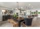 Open concept dining area with kitchen view and island at 1090 Battery Park Rd, Decatur, GA 30033