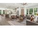 Open living room and kitchen with hardwood floors and modern design at 1090 Battery Park Rd, Decatur, GA 30033