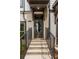 Inviting front entrance with brick steps and black metal railing at 1090 Battery Park Rd, Decatur, GA 30033