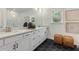 Modern bathroom with double vanity and hexagon tile flooring at 1090 Battery Park Rd, Decatur, GA 30033