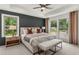 Spacious main bedroom with ample natural light and a ceiling fan at 1090 Battery Park Rd, Decatur, GA 30033