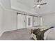 Main bedroom with barn doors leading to the ensuite bathroom at 4013 Chelsea Ln, Marietta, GA 30062