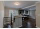 Open concept kitchen with breakfast bar and granite countertops at 1784 Danrich Dr, Decatur, GA 30032