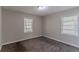 Well lit bedroom with neutral colored walls and carpet at 1784 Danrich Dr, Decatur, GA 30032
