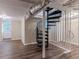 Basement with spiral staircase and access to exterior at 1784 Danrich Dr, Decatur, GA 30032