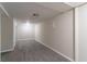 Spacious basement with carpeted floor and neutral walls at 1784 Danrich Dr, Decatur, GA 30032