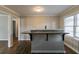Granite kitchen island with black metal supports at 1784 Danrich Dr, Decatur, GA 30032