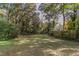 Wooded backyard providing a private and natural setting at 1784 Danrich Dr, Decatur, GA 30032
